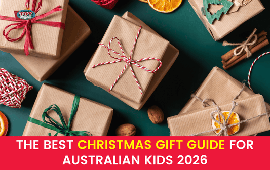 Christmas gifts wrapped in brown paper, with text: The best Christmas gift guide for Australian kids 2026.