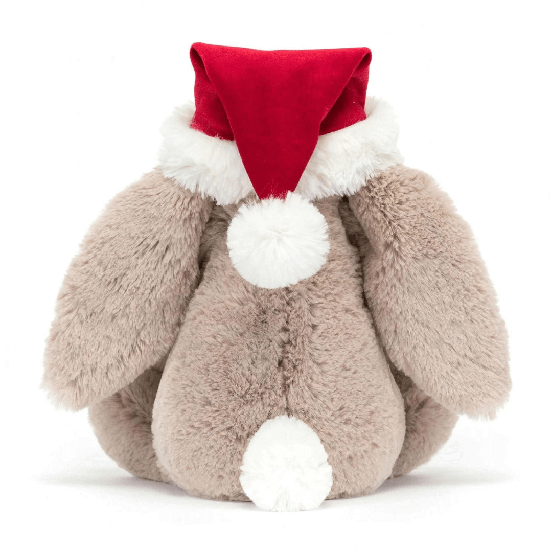 Jellycat classic medium bashful bunny with a red and white santa christmas hat at Toyworld