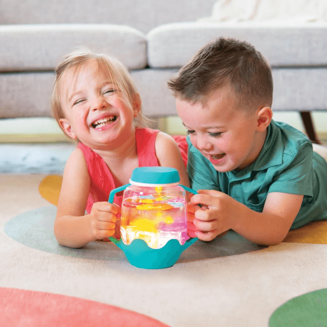 Jellystone Glo Pal sensory jars add your cubes, and sensory tools and watch it glow children sampling the product toyworld lismore