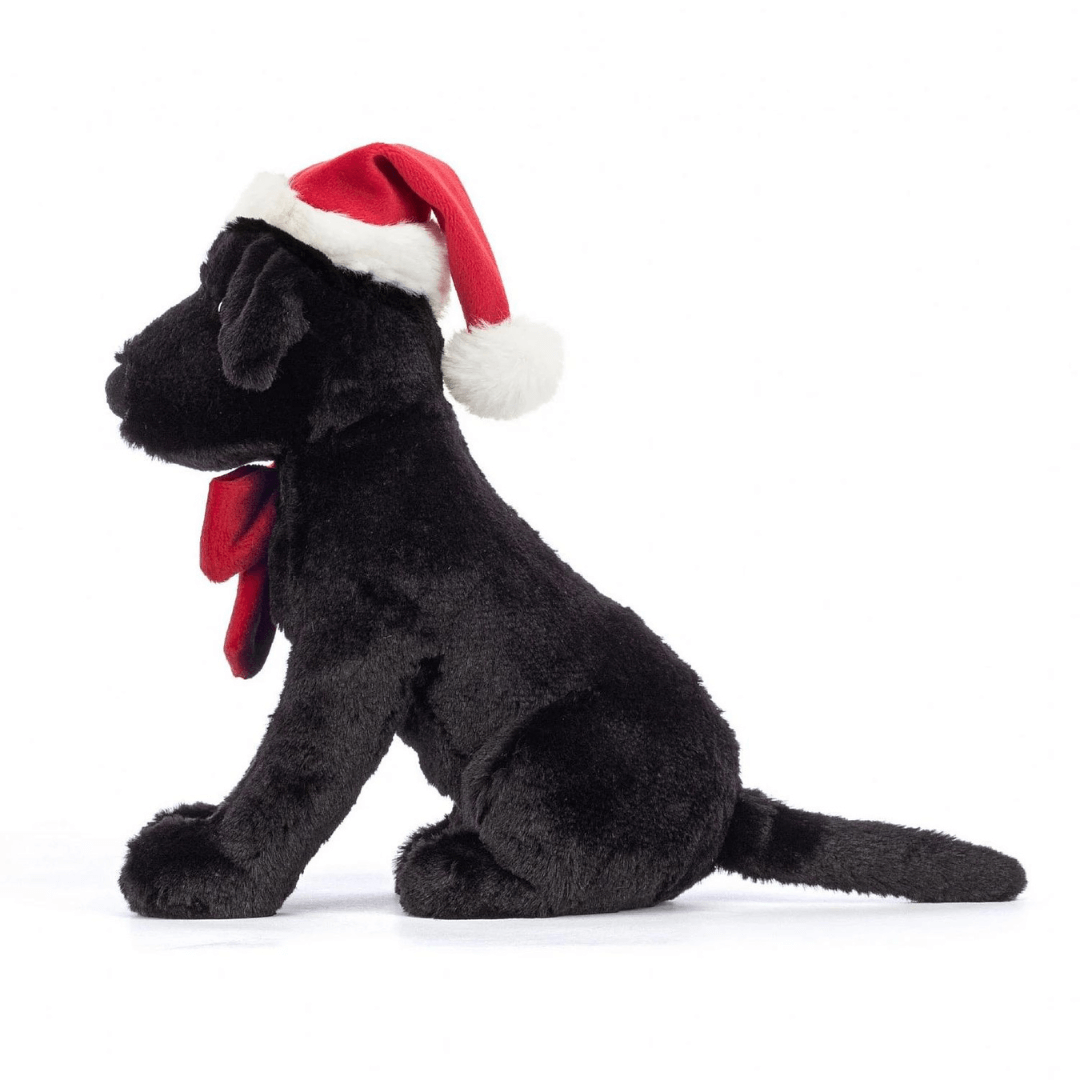 Jellycat Pippa Black Labrador with santa hat and red ribbon soft toy available at Toyworld Lismore, Byron Bay and Ballina