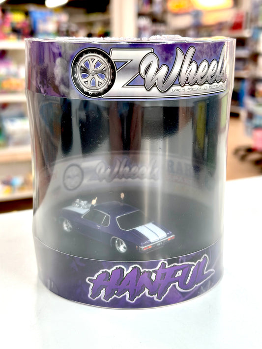 Oz Wheels - 1:64 Hanful Monaro Skid Purple with White stripe in Cylinder