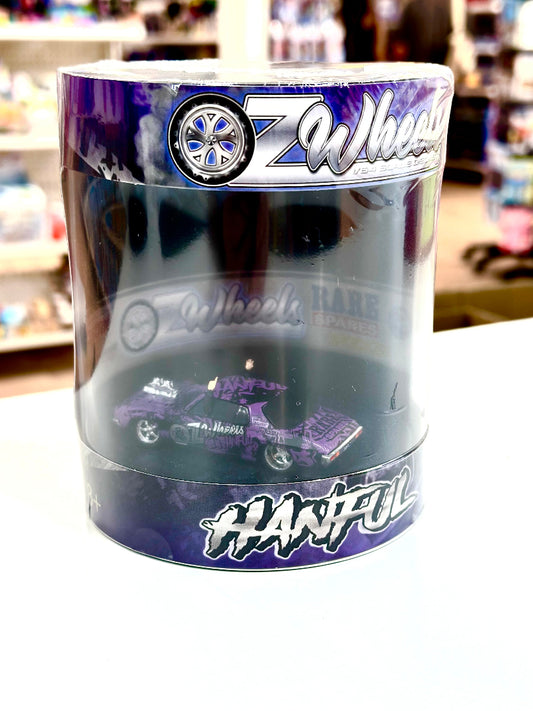 Oz Wheels - 1:64 Wrapped Hanful Monaro Skid Purple in Cylinder
