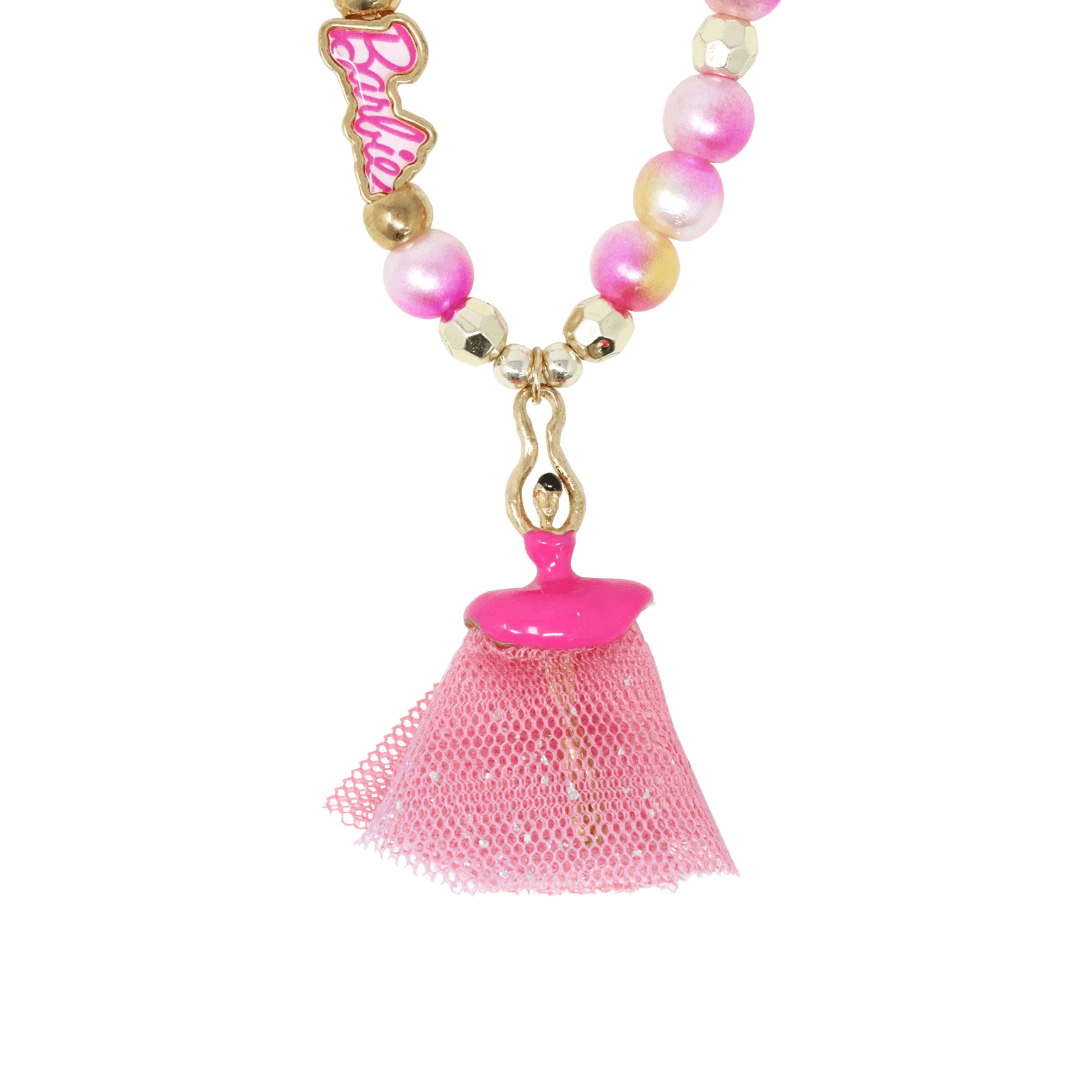 Barbie ballerina necklace with pinky pearly beads up close of pendant