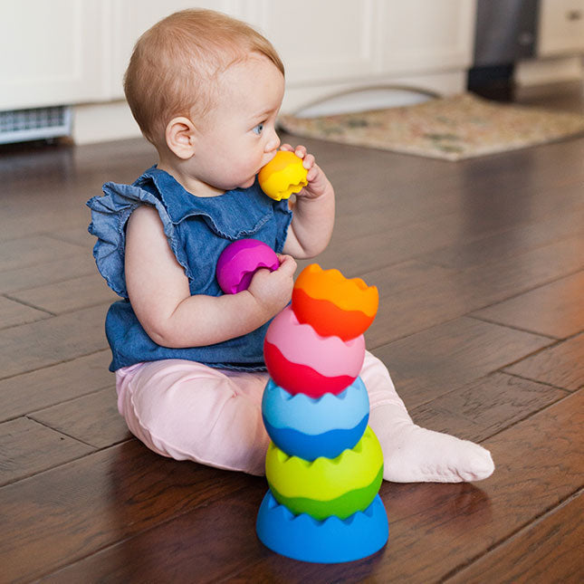 Fat Brain Toys Tobbles Neo toy in childs mouth